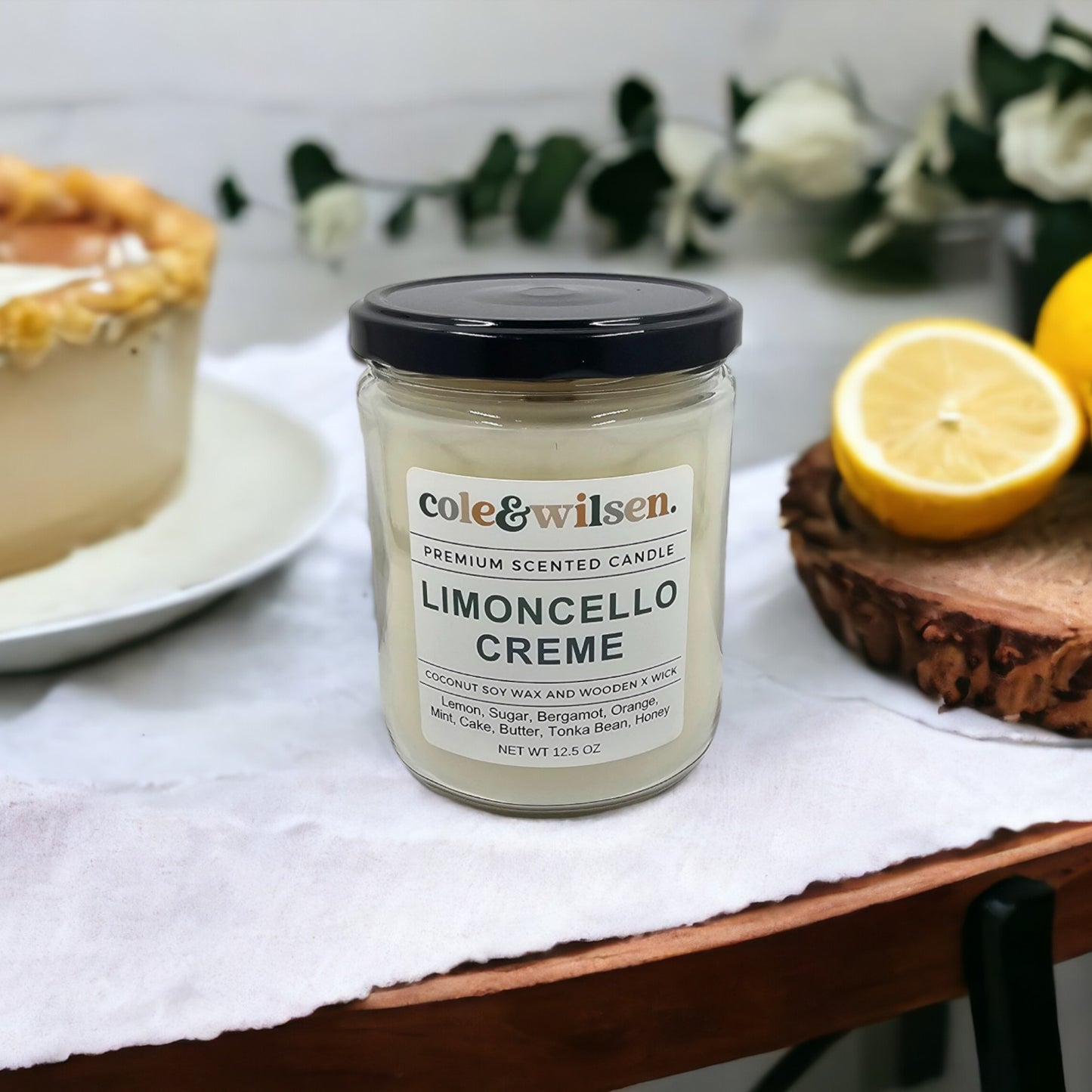 a jar of lemoncello creme sitting on a table