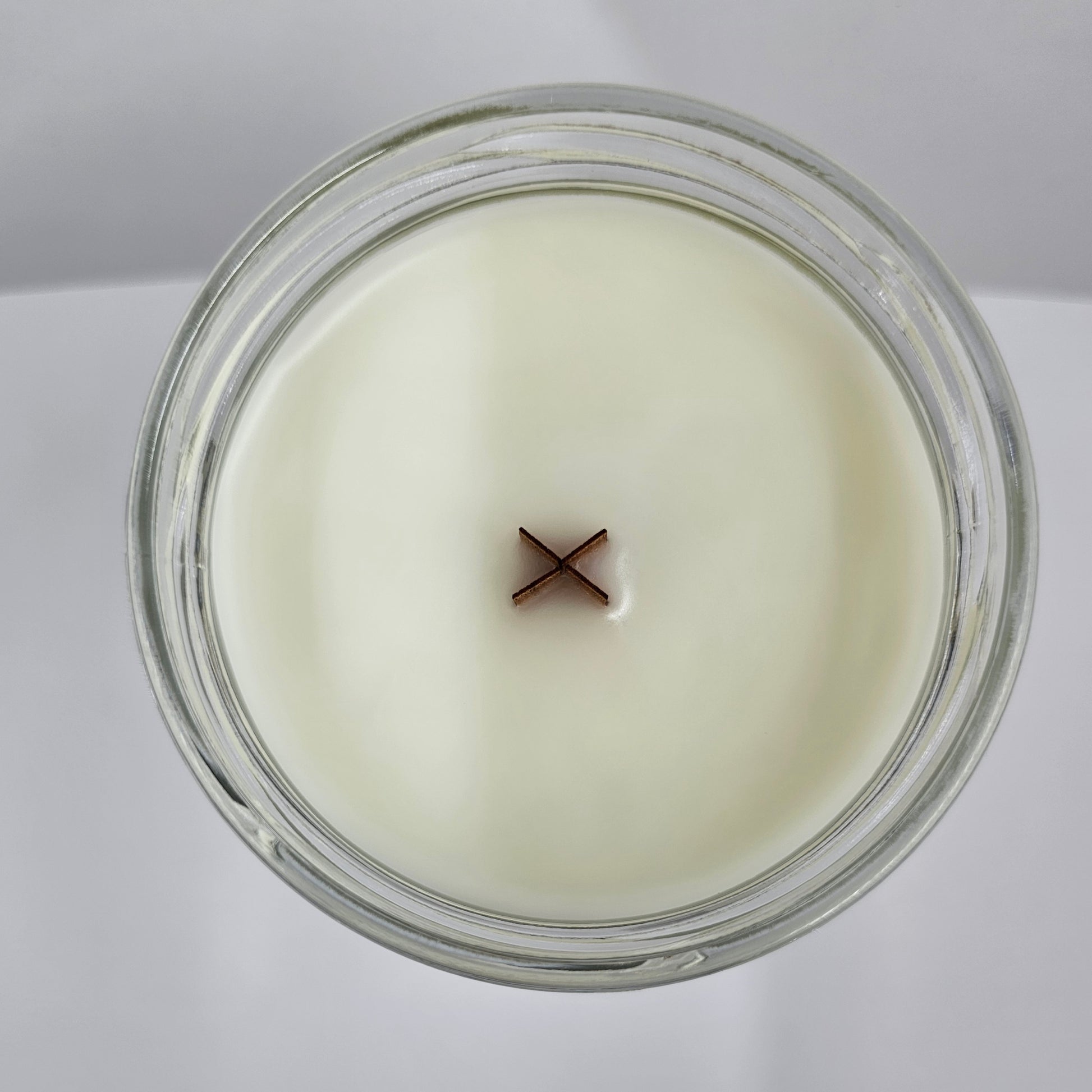 a glass jar filled with a white liquid